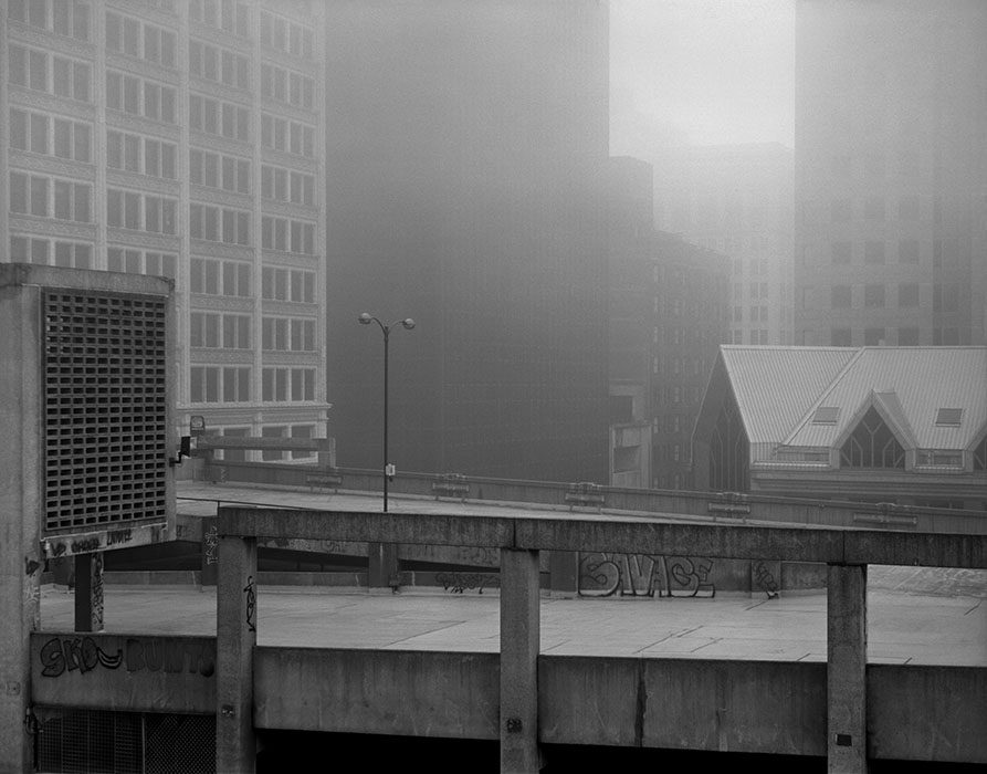 /product//famous-barr-parking-garage-buildings-dawn-fog-2021/